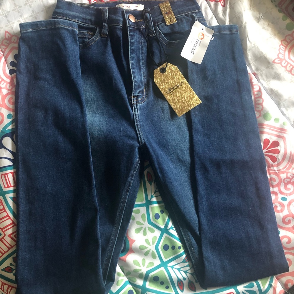 Dark blue skinny jeans, they are very stretchy soft material.